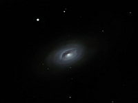 M64  Blackeye Galaxy. Taken at home on 04/14/05.  Meade LX200 GPS 8" scope, DSI-C camera, alt/az mount. 20 seconds/frame, total time 60 minutes.