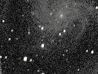 NGC 6946  NGC 6946 with supernova SN 2400et. Taken at home on 10/03/04.  Meade LX200 GPS 8" scope, ToUCam.  30 seconds/frame, total time 25 minutes. The supernova is the brightest object towards the lower right side of the photo. It was discovered on 09/22/04 just a few days before I took the photo. I didn't know about the supernova and was just lucky to capture it.